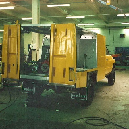 Ál og trefjaplastyfirbygging